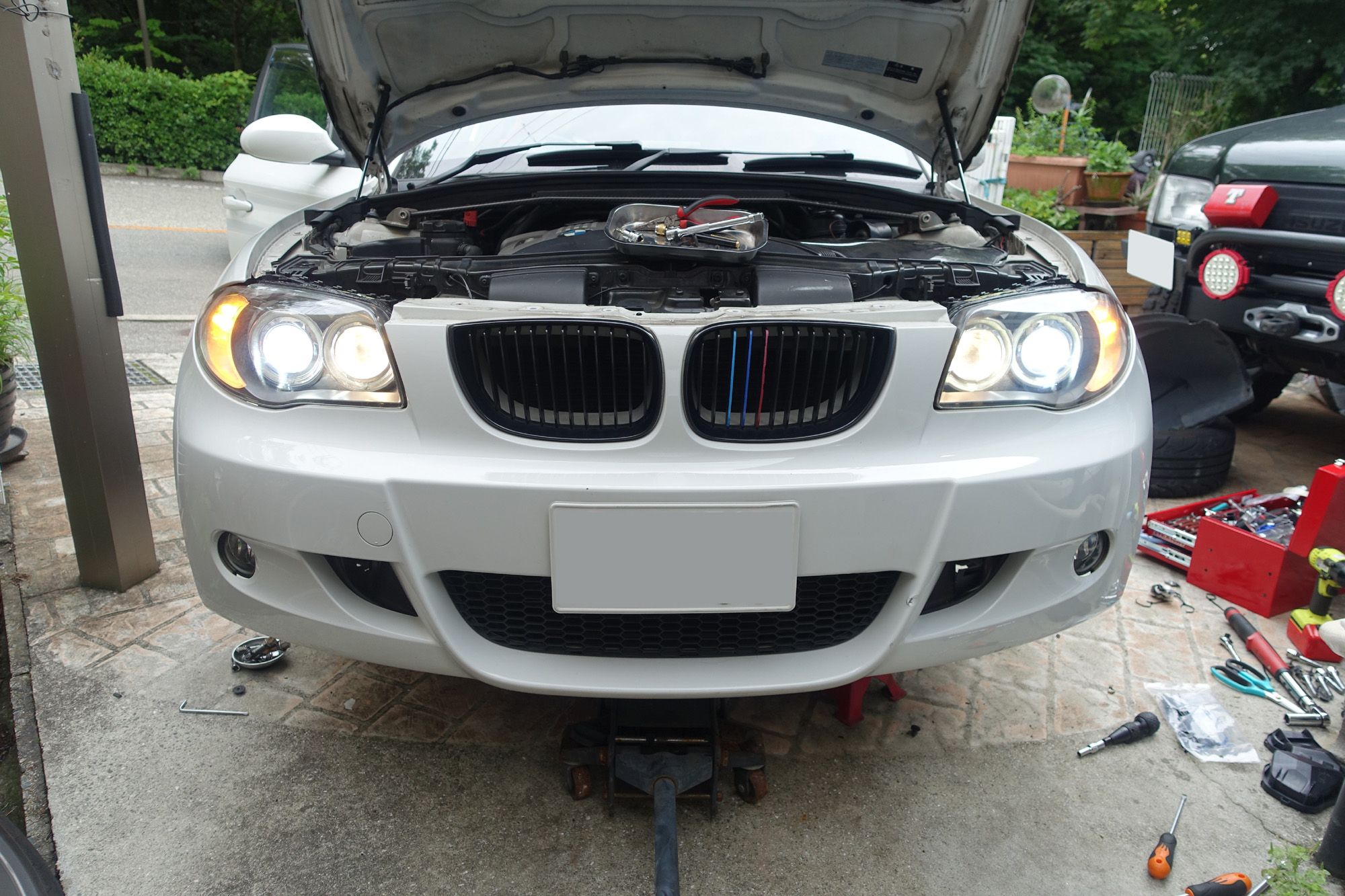 BMW 130i E87 ヘッドライトレンズ（アクリルカバー）交換　その４　116iの格安美品レンズを流用します。